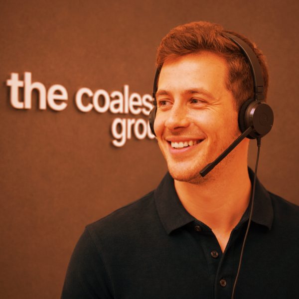 Home Lead Gen team member wearing headset on sales call